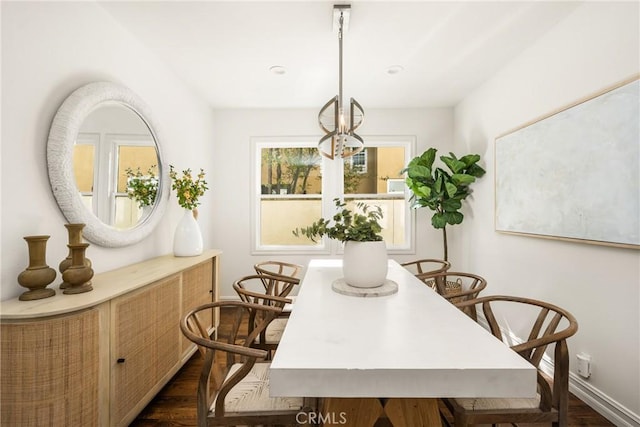 dining space with baseboards