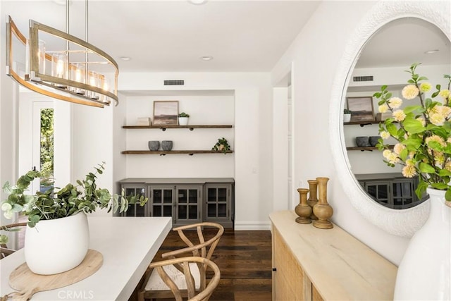 bar with visible vents, pendant lighting, dark wood-type flooring, and recessed lighting