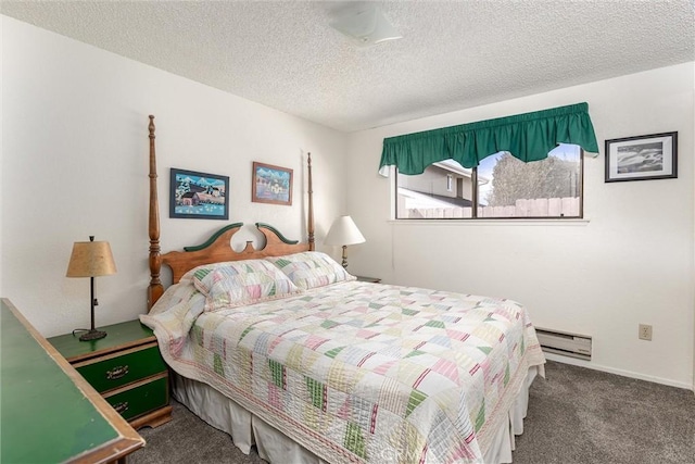 bedroom with a textured ceiling, a baseboard radiator, and carpet flooring