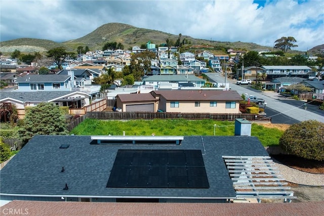 drone / aerial view featuring a mountain view and a residential view