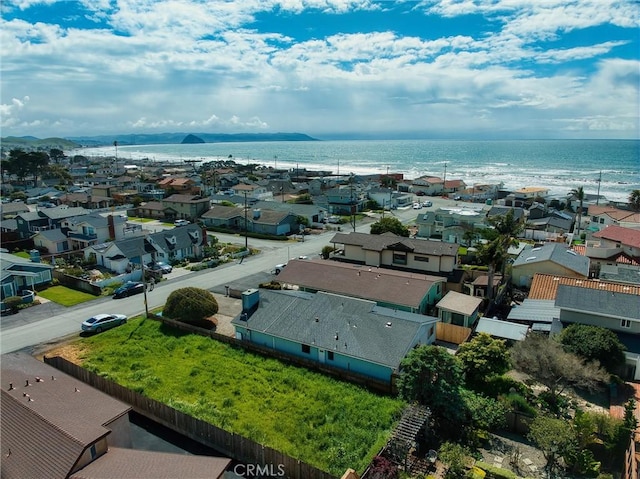 bird's eye view with a residential view and a water view