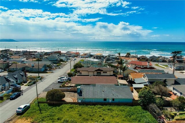 aerial view with a residential view and a water view