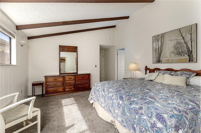 carpeted bedroom with lofted ceiling with beams and a textured ceiling