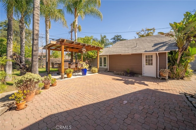 view of patio with french doors and a pergola