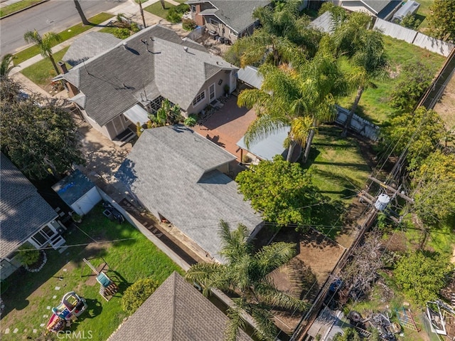 birds eye view of property with a residential view