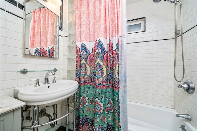 full bath featuring shower / bath combo and a sink