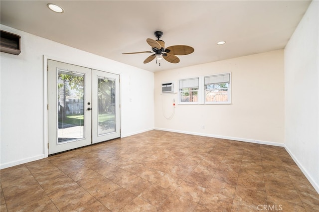 unfurnished room with a ceiling fan, a wall mounted AC, recessed lighting, french doors, and baseboards