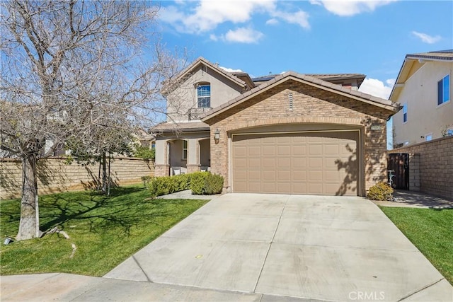 view of front of property with concrete driveway, brick siding, fence, and a front lawn