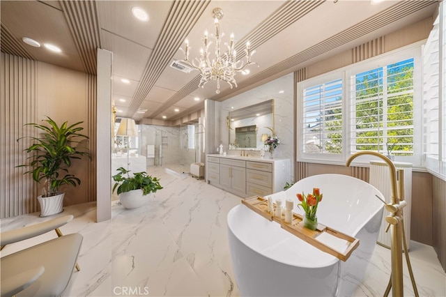 bathroom with visible vents, marble finish floor, a shower stall, and vanity