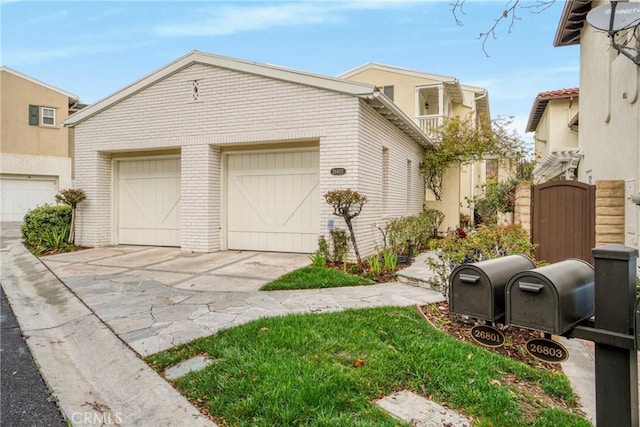 26803 Brookhollow Dr, Valencia, CA 91355 - view of front of home with brick siding and concrete driveway