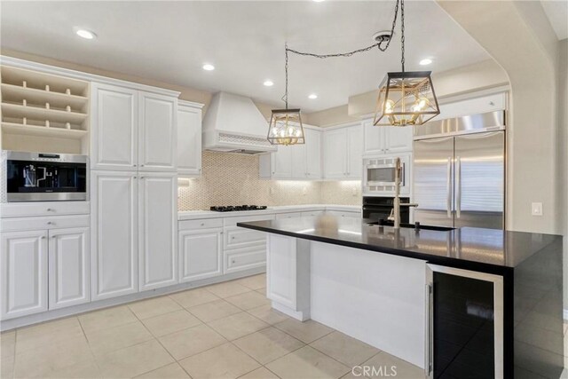 26803 Brookhollow Dr, Valencia, CA 91355 - kitchen featuring wine cooler, custom exhaust hood, black appliances, a sink, and a chandelier