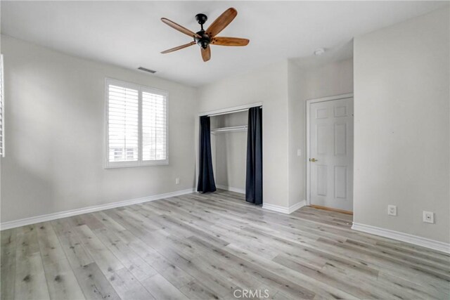 26803 Brookhollow Dr, Valencia, CA 91355 - unfurnished bedroom with light wood-type flooring, a closet, and baseboards