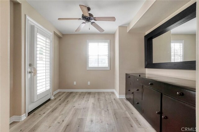 26803 Brookhollow Dr, Valencia, CA 91355 - unfurnished dining area with light wood-style floors, baseboards, and a ceiling fan