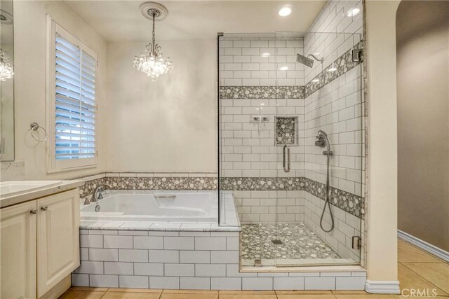 26803 Brookhollow Dr, Valencia, CA 91355 - bathroom featuring a shower stall, a bath, tile patterned flooring, vanity, and plenty of natural light