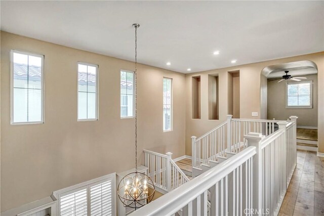 26803 Brookhollow Dr, Valencia, CA 91355 - hallway featuring an upstairs landing, light wood-style flooring, recessed lighting, and baseboards