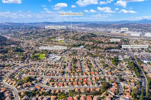 bird's eye view featuring a residential view and a mountain view