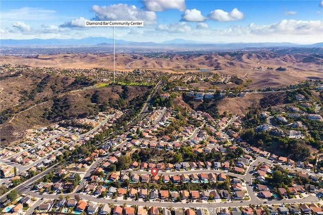 aerial view featuring a residential view and a mountain view