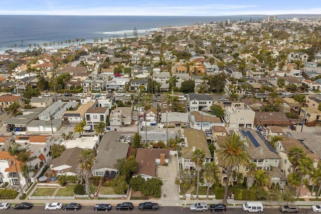 bird's eye view with a water view and a residential view