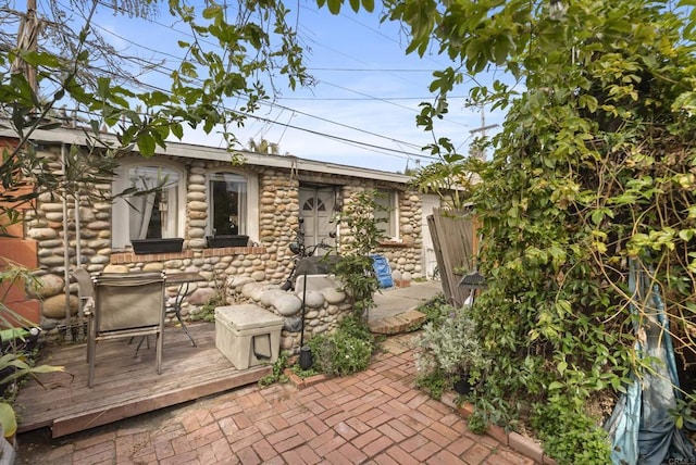 view of patio / terrace featuring a wooden deck