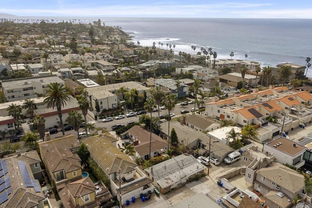 birds eye view of property featuring a water view and a residential view