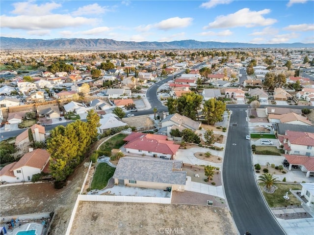 birds eye view of property featuring a residential view and a mountain view