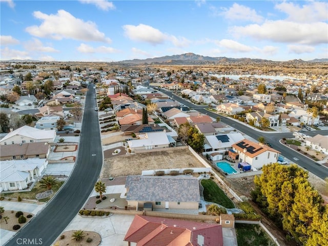 birds eye view of property featuring a residential view and a mountain view