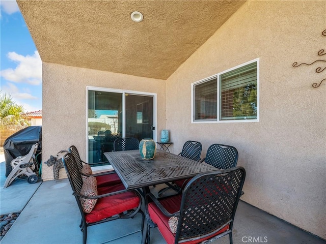 view of patio with outdoor dining space