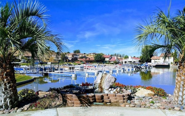 property view of water featuring a boat dock