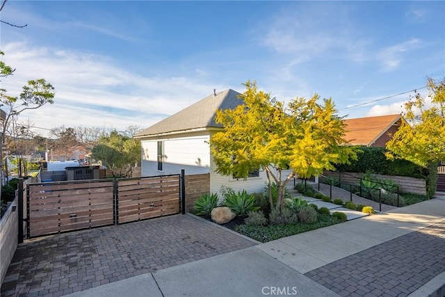 exterior space with a gate and fence