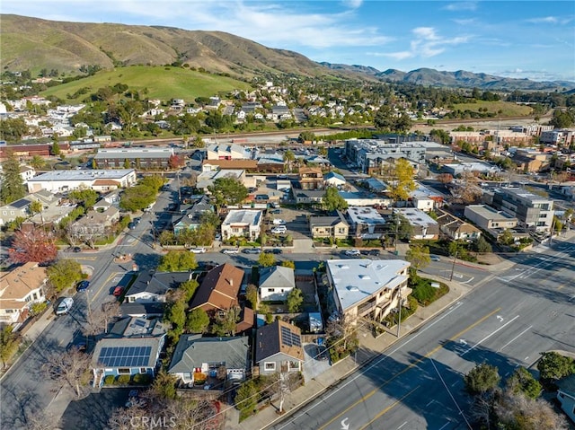 birds eye view of property with a residential view and a mountain view