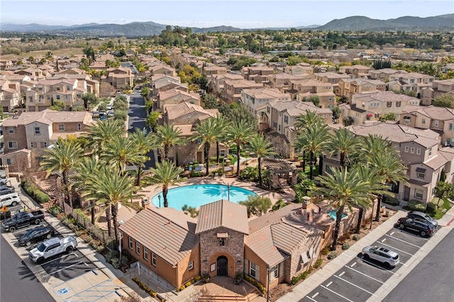 drone / aerial view with a residential view and a mountain view