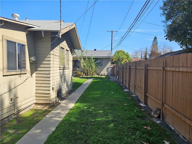 view of yard with fence