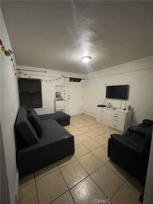 living area featuring light tile patterned floors