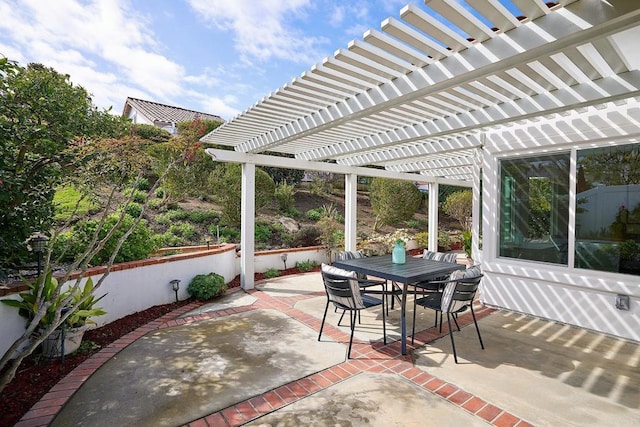 view of patio / terrace with outdoor dining area and a pergola