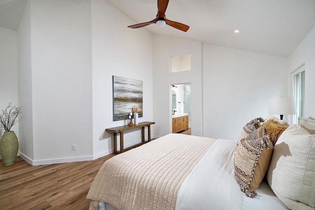 bedroom featuring recessed lighting, a ceiling fan, vaulted ceiling, wood finished floors, and baseboards