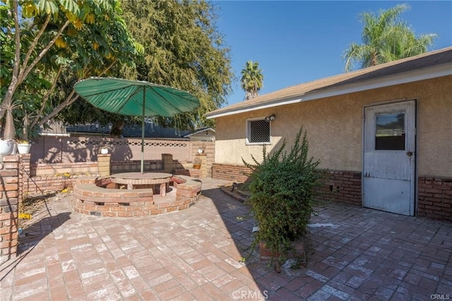 view of patio with fence