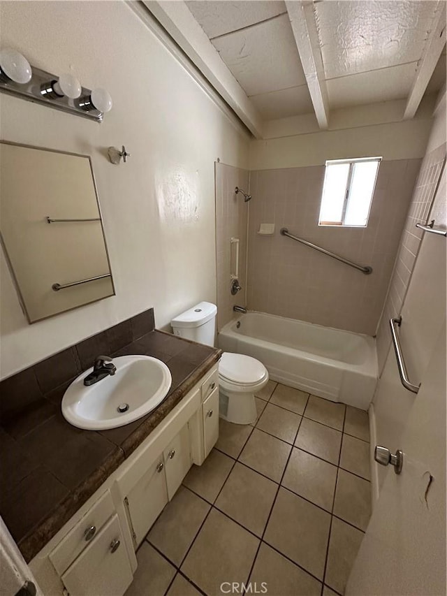 bathroom featuring toilet, tile patterned floors, a textured ceiling, vanity, and shower / bathing tub combination