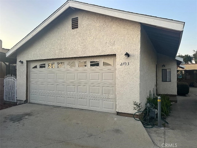 garage with driveway