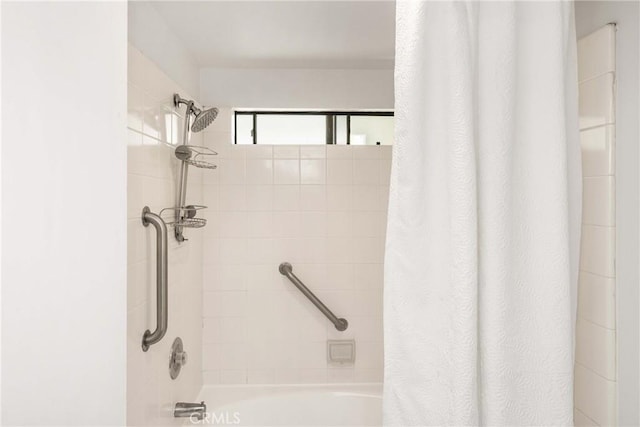 full bathroom with shower / bath combo