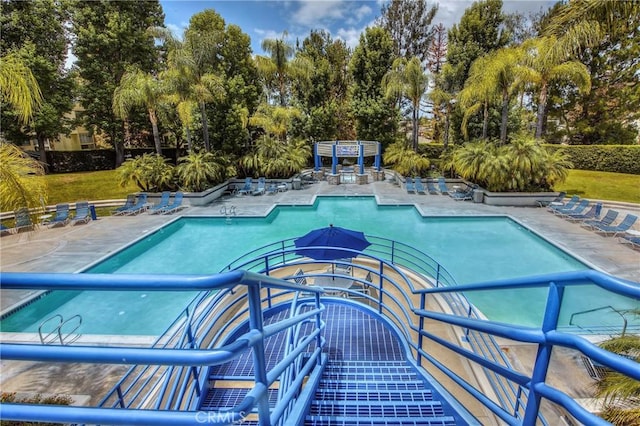 community pool featuring a patio