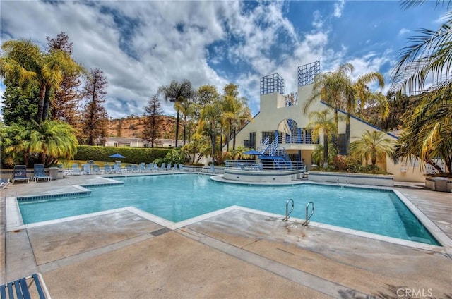 pool featuring a patio