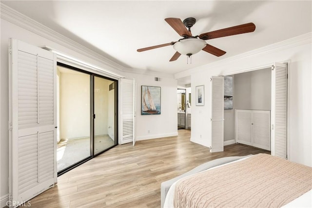 bedroom with baseboards, light wood-style floors, a ceiling fan, and crown molding