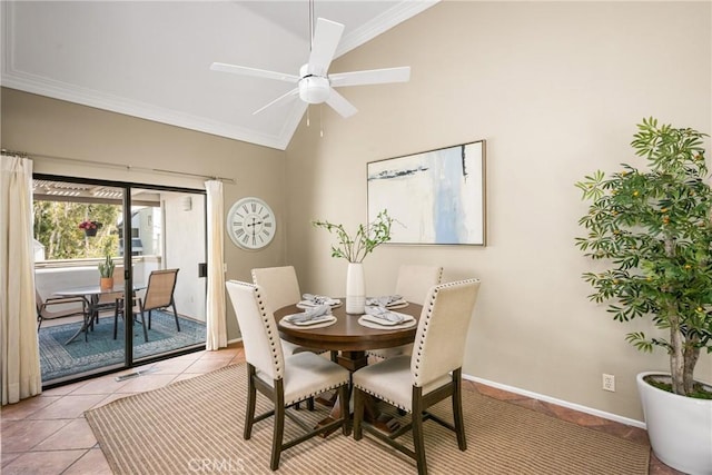 dining area with light tile patterned floors, baseboards, visible vents, lofted ceiling, and ornamental molding