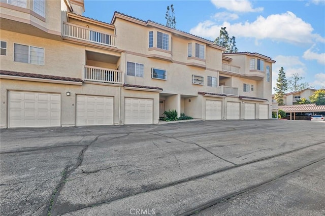 view of building exterior featuring a garage