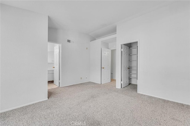 unfurnished bedroom with visible vents, carpet flooring, and baseboards