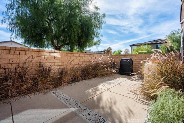 view of patio with a fenced backyard