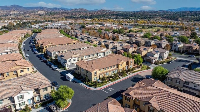 birds eye view of property featuring a residential view and a mountain view