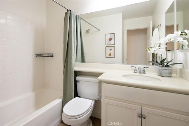 full bath featuring shower / tub combo, vanity, and toilet