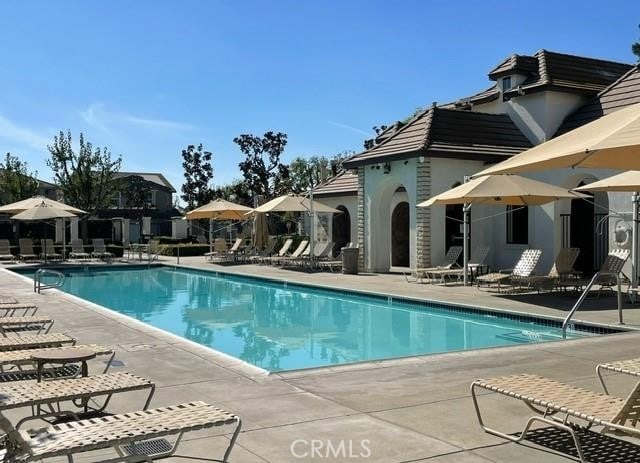 community pool featuring a patio