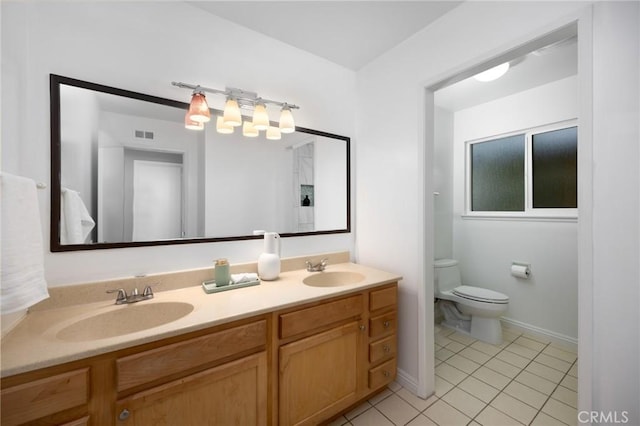 full bath featuring tile patterned floors, visible vents, toilet, and a sink